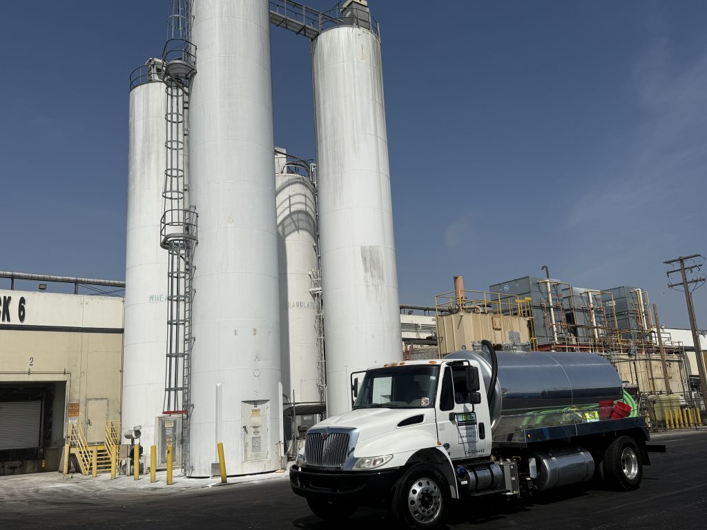Grease collection service truck at a recycling facility in Los Angeles County