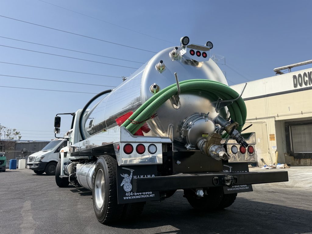 Truck transporting collected yellow grease for restaurant grease recycling